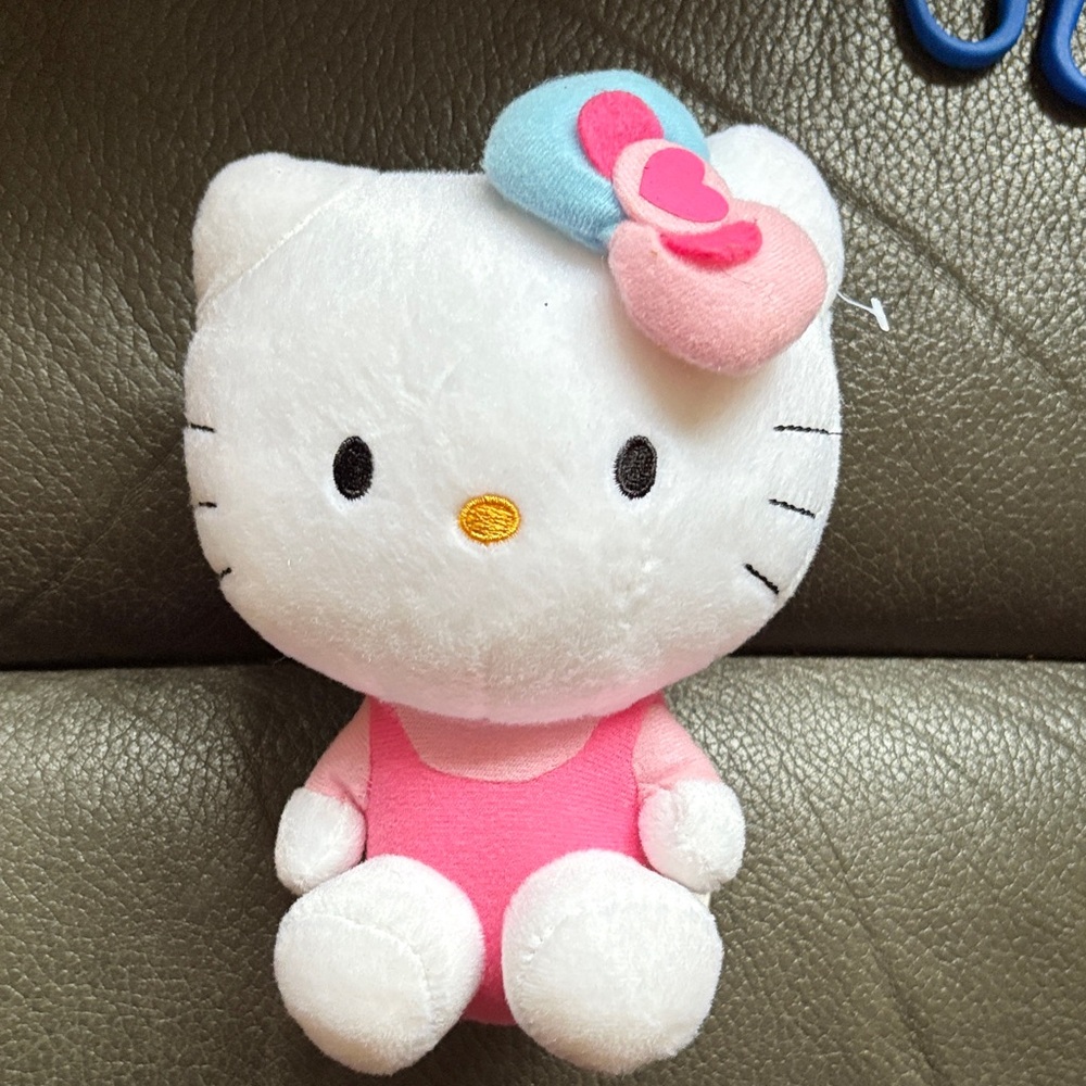 Hello kitty pink and blue stuffed animal
